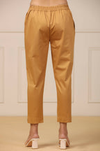 Juniper Women's Gold Cotton Twill Lycra Solid Straight Pant | Grocsy