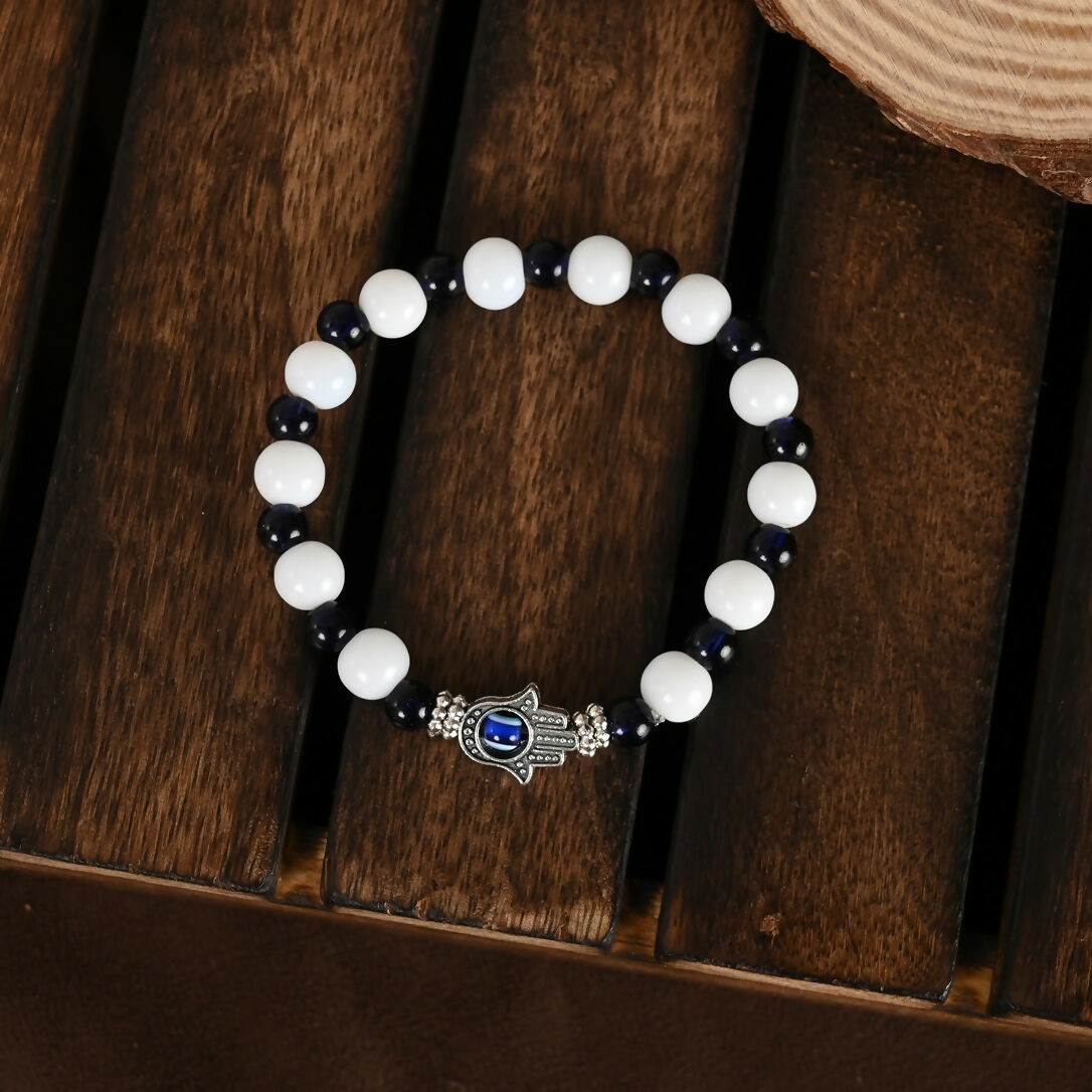 NVR Women & Men Black & White Evil Eye Elasticated Rakhi With Roli Chawal | Grocsy