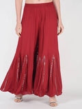Mominos Fashion Maroon Viscose Rayon Flared Palazzo with Mirror Lace Work | Grocsy
