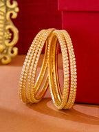 NVR Women Set of 8 American Diamond Gold-Polished Bangles