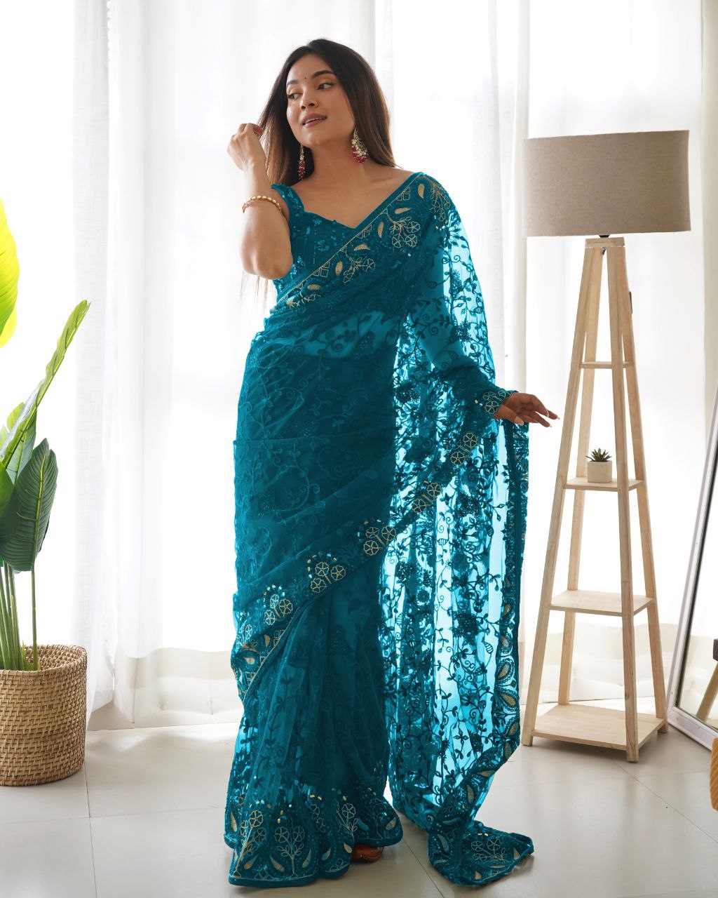 Teeya Creation Sky Color Butterfly Net Heavy Zari Work Ston And Mirror Work Saree | Grocsy