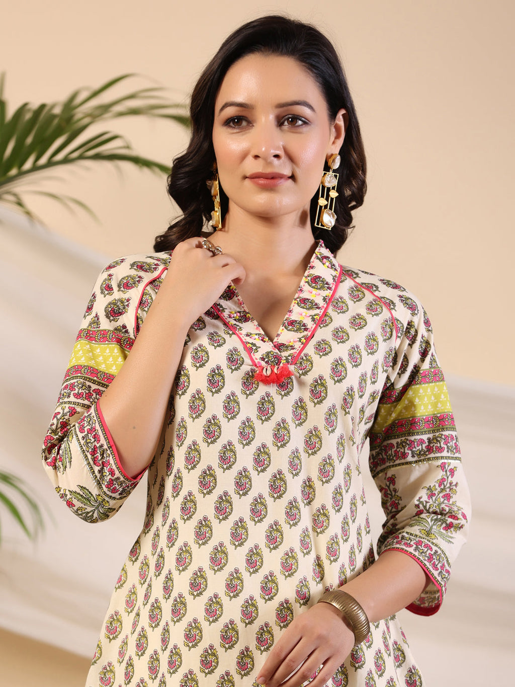 Juniper Women Beige Ethnic Motif Printed High Low Cotton Kurta With Kaudis Tassels & Contract Piping | Grocsy