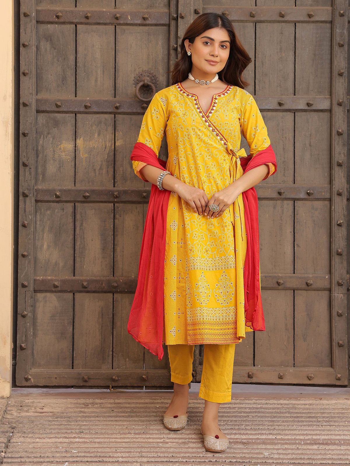 Juniper Mustard Bandhani Print Angrakha Cotton Kurta With Pants & Dupatta Set With Mirror Work Embroidery | Grocsy