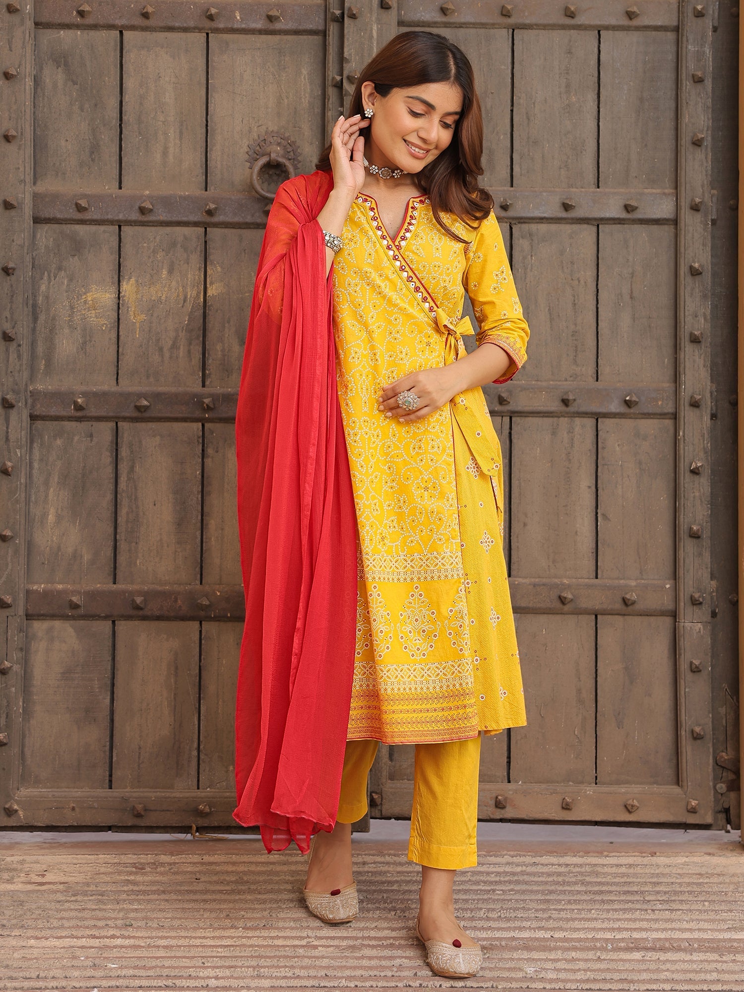 Juniper Mustard Bandhani Print Angrakha Cotton Kurta With Pants & Dupatta Set With Mirror Work Embroidery | Grocsy