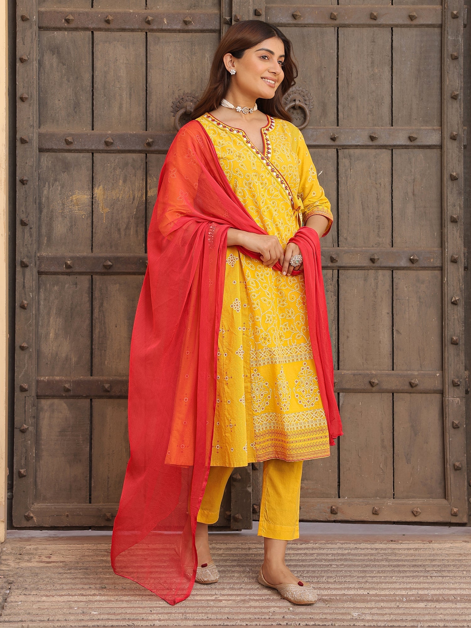 Juniper Mustard Bandhani Print Angrakha Cotton Kurta With Pants & Dupatta Set With Mirror Work Embroidery | Grocsy