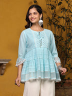 Juniper Sky Blue Solid Peplum Lacy Keyhole Neckline Tunic With Lining | Grocsy