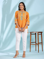 Juniper Mustard Rayon Ikat Placement Printed High-Low Tunic With Side Slits & Tassels | Grocsy