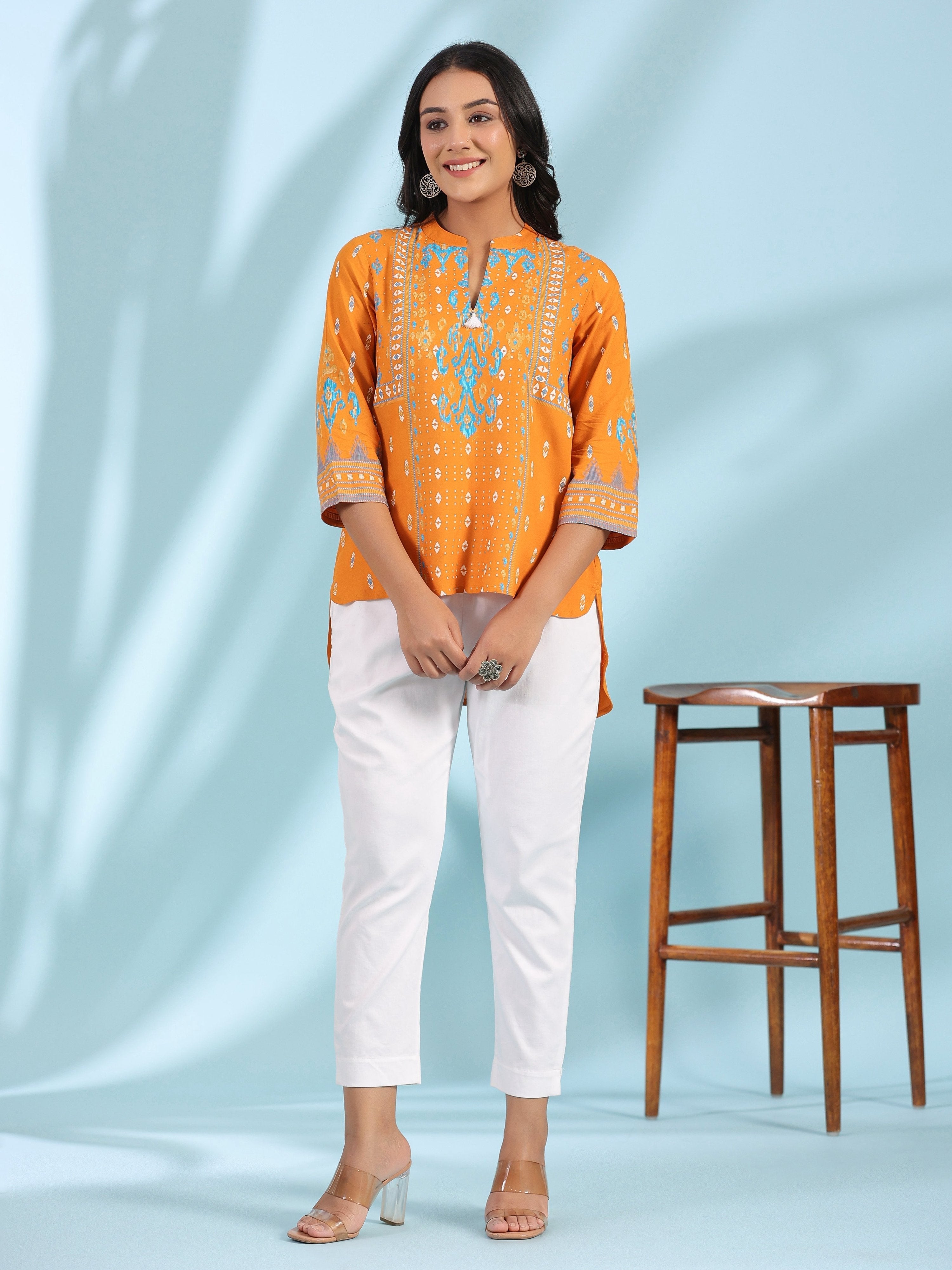 Juniper Mustard Rayon Ikat Placement Printed High-Low Tunic With Side Slits & Tassels | Grocsy