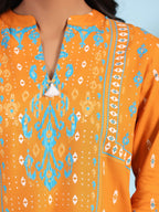 Juniper Mustard Rayon Ikat Placement Printed High-Low Tunic With Side Slits & Tassels | Grocsy