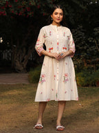 Juniper White Floral Printed A-Line Pleated Cotton Dress With Kantha Work & Tassels | Grocsy