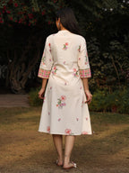 Juniper White Floral Printed A-Line Pleated Cotton Dress With Kantha Work & Tassels | Grocsy