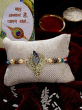 NVR Men Gold-Toned Peacock Design Stone-Studdded Rakhi With Roli Chawal & Chocolate | Grocsy