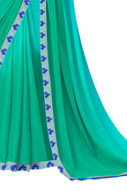 Vamika Rama Green Designer Saree With Double Blouse 1. Plain Silk Blouse 2. Poncho Blouse (With Embroidery And Stone Work) | Grocsy