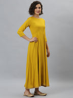 Janasya Women's Mustard Rayon Solid Flared Casual Kurta Set | Grocsy