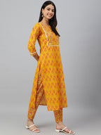 Janasya Women's Mustard Cotton Floral Print Kurta With Pant | Grocsy
