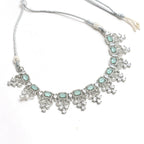 Mominos Fashion Johar Kamal Silver-Plated American Diamond Pista Green Choker Set | Grocsy