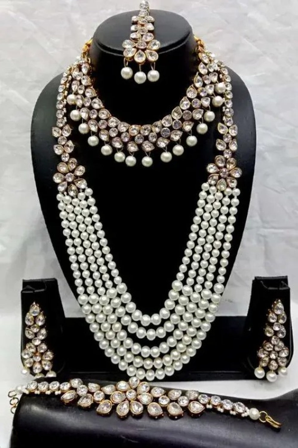 Jewel City Luxury Pearl and Crystal Bridal Jewelry Set - Traditional Indian Wedding Necklace Set with Earrings, Tikka, and Bracelet | Grocsy