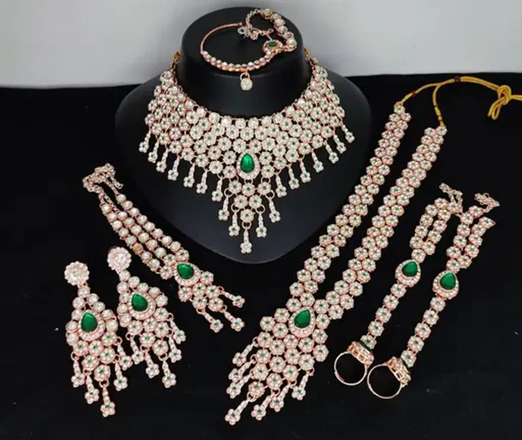 Jewel City Emerald Green Bridal Jewelry Set - Premium AD Choker Set with Nath, Earrings & Hand Chain - Handcrafted Wedding Collection Kundan Style | Grocsy