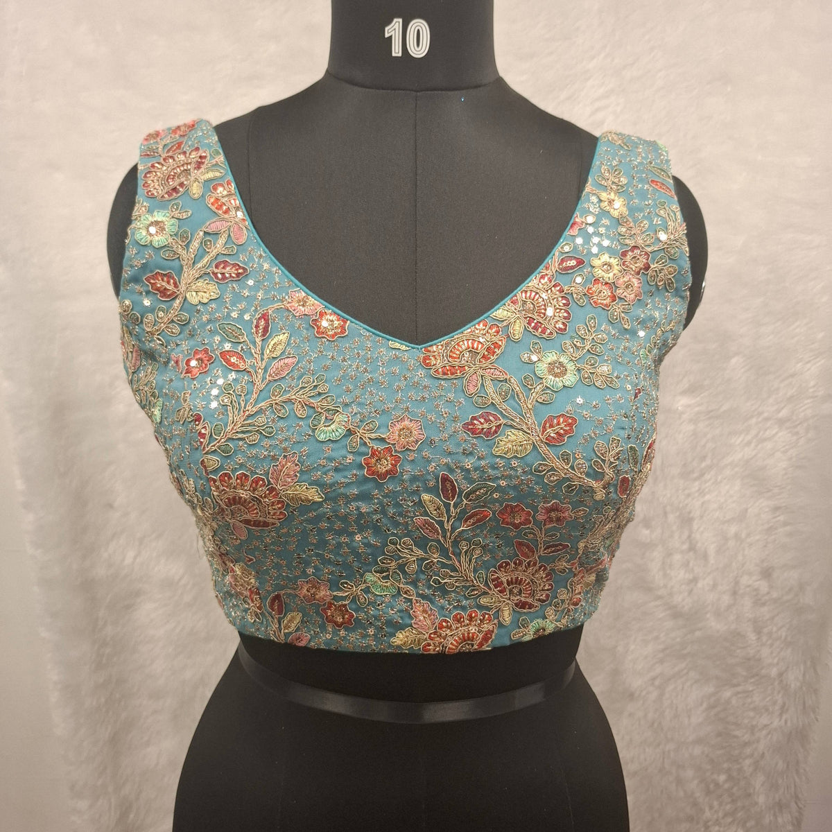 Kia Fashions Aqua Blue Georgette Multi Color Emb & Sqn Readymade Blouse | Grocsy