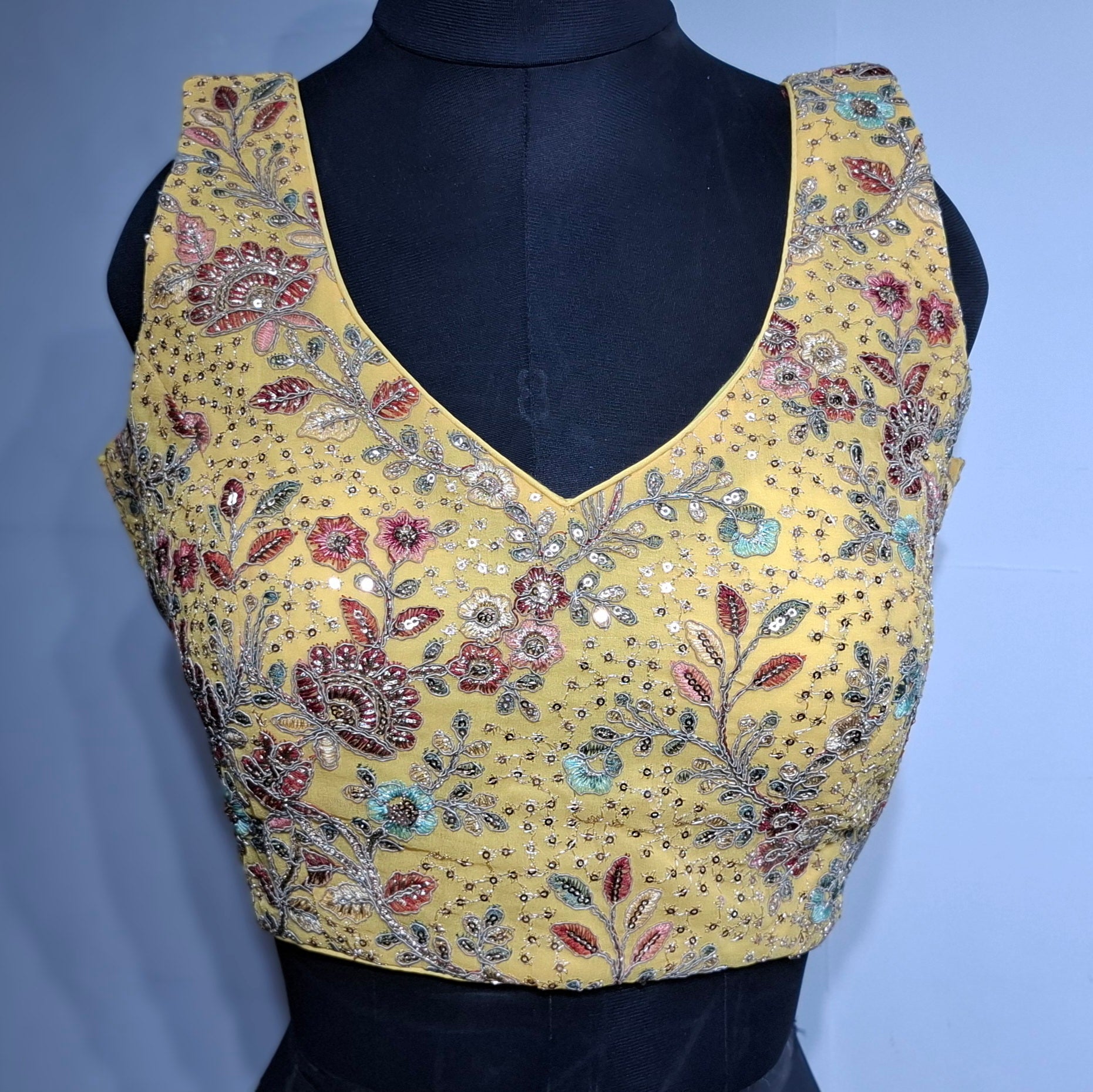 Kia Fashions Eggyolk Yellow Georgette Multi Color Emb & Sqn Readymade Blouse | Grocsy