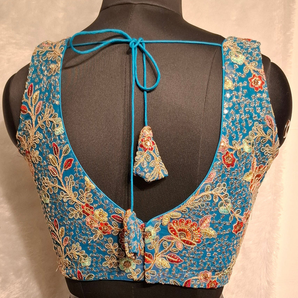Kia Fashions Turquoise Blue Georgette Multi Color Emb & Sqn Readymade Blouse | Grocsy
