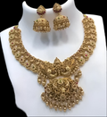 Jewel City Royal Antique Gold Peacock Motif Necklace Set with Jhumka Earrings - Premium Bridal Temple Jewelry with Ruby & Emerald Accents | Grocsy