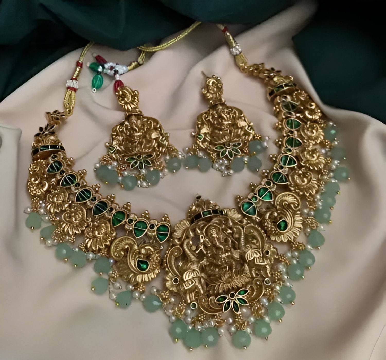Jewel City Temple Gold Ganesh Necklace Set with Emerald Green Stones & Pearl Droplets Traditional Ethnic Indian Bridal Jewelry Set | Grocsy