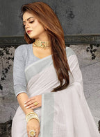 Shree Shyam Fashion Elegant White Woven Linen Saree with Contrast Zari Border & Tassels - Soft & Breathable Party Wear | Grocsy