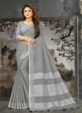 Shree Shyam Fashion Elegant Dark Grey Woven Linen Saree with Contrast Zari Border & Tassels - Soft & Breathable Party Wear | Grocsy