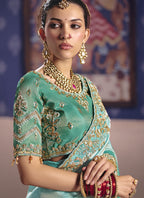 Vegaa Fashion Turquoise Silk Embroidered Wedding Wear Saree | Grocsy