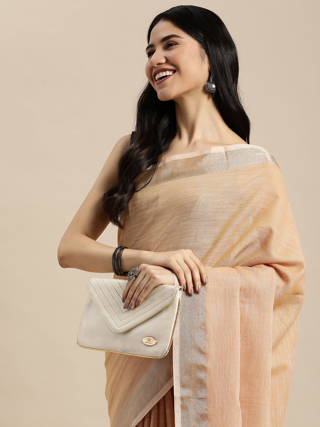 Shree Shyam Fashion Elegant Tan Woven Linen Saree with Contrast Zari Border & Tassels - Soft & Breathable Party Wear | Grocsy