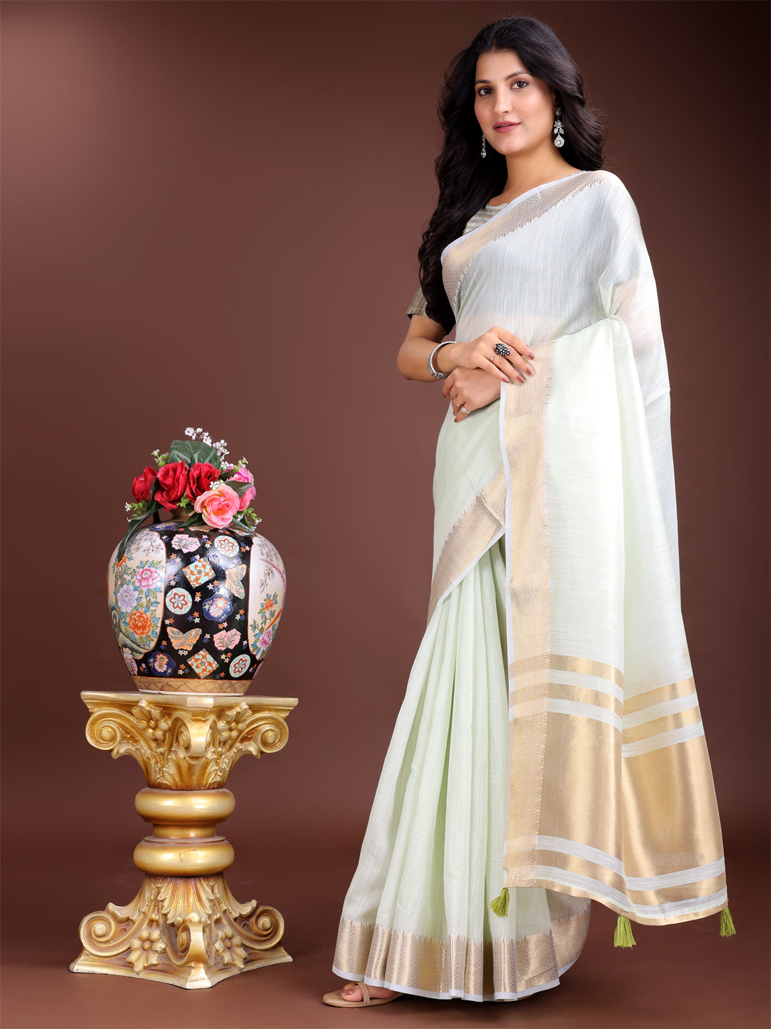 Shree Shyam Fashion Elegant Light Green Woven Linen Saree with Contrast Zari Border & Tassels - Soft & Breathable Party Wear | Grocsy