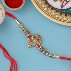 trueBrowns X Voylla Designer Ganesha Rakhi With Roli Chaawal Pack | Grocsy