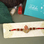 trueBrowns X Voylla Divine Rudraksha Ganesha Rakhi With Roli Chaawal Pack | Grocsy