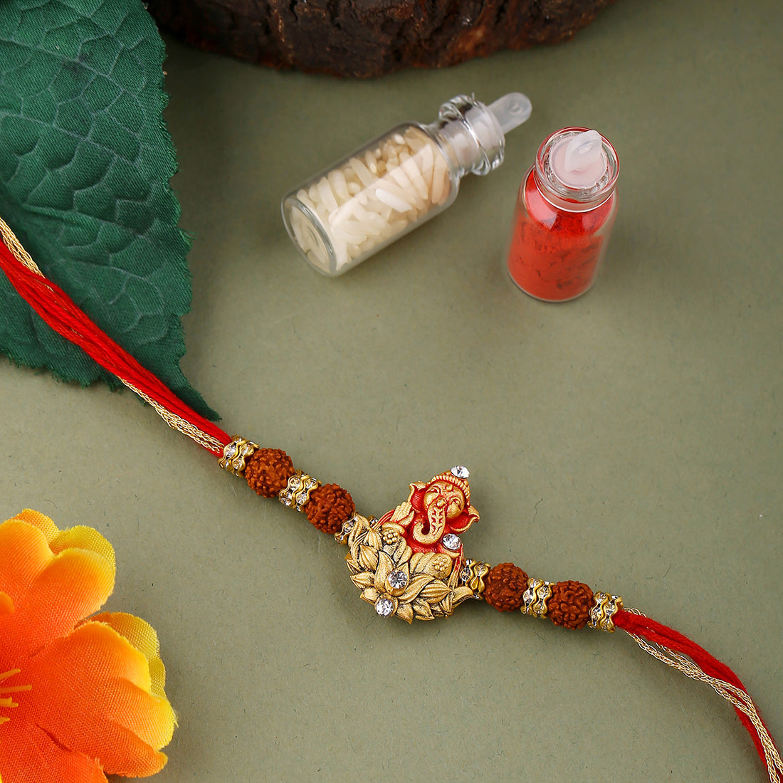 trueBrowns X Voylla Divine Rudraksha Ganesha Rakhi With Roli Chaawal Pack | Grocsy