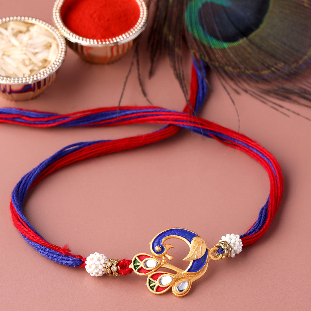 trueBrowns X Voylla Designer Enameled Peacock Rakhi With Roli Chaawal Pack | Grocsy