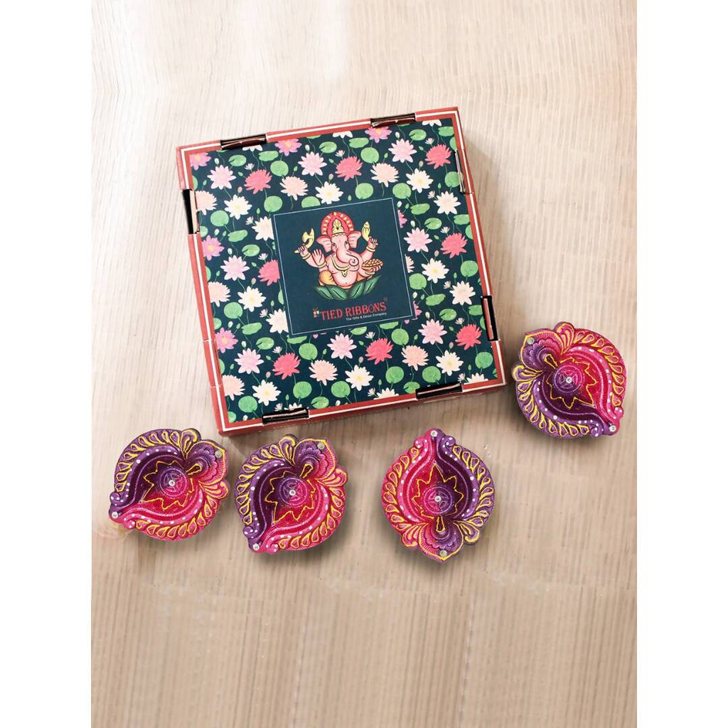 Tied Ribbons Set of 4 Red & Violet Textured Terracotta Diyas | Grocsy