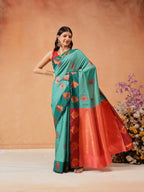 Hiral Fashion Turquoise Blue Banarasi Silk Floral Woven Design Saree | Grocsy