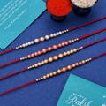 trueBrowns X Voylla Set of 4 Pearl Beads Embellished Flamboyant Rakhi | Grocsy