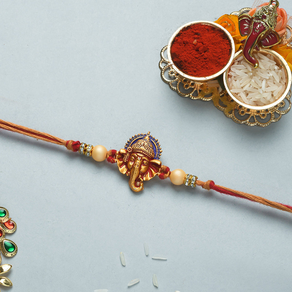 trueBrowns X Voylla Deity Inspired CZ Embellished Ganpati Rakhi | Grocsy