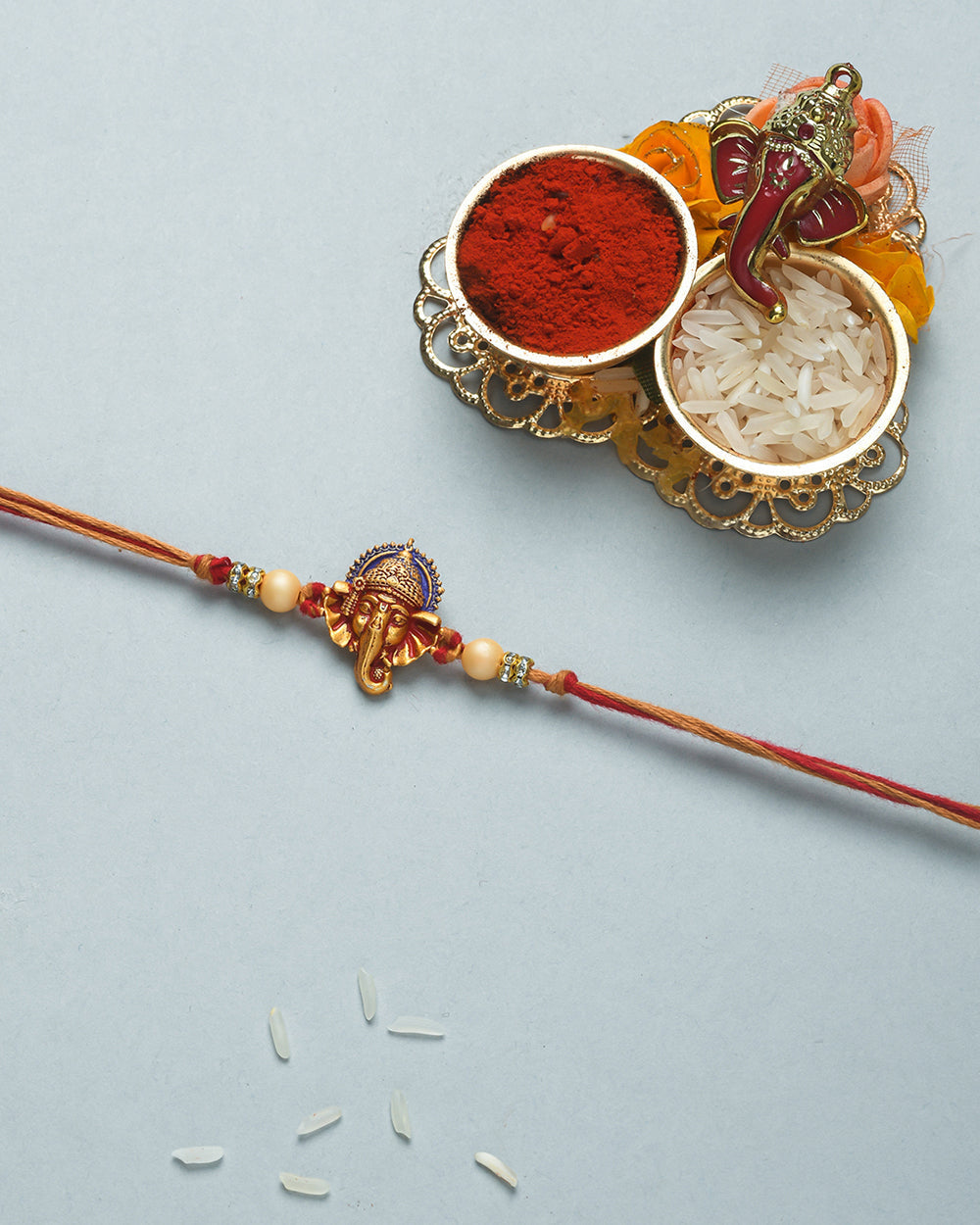 trueBrowns X Voylla Deity Inspired CZ Embellished Ganpati Rakhi | Grocsy