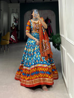 Lorenvalley Skyblue Tussar Silk Patola Print With Foil Work And Original Mirror Gamthi Lace Lehenga Choli with Dupatta | Grocsy