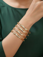NVR Women Set of 4 Gold Plated CZ Stone Bangle | Grocsy