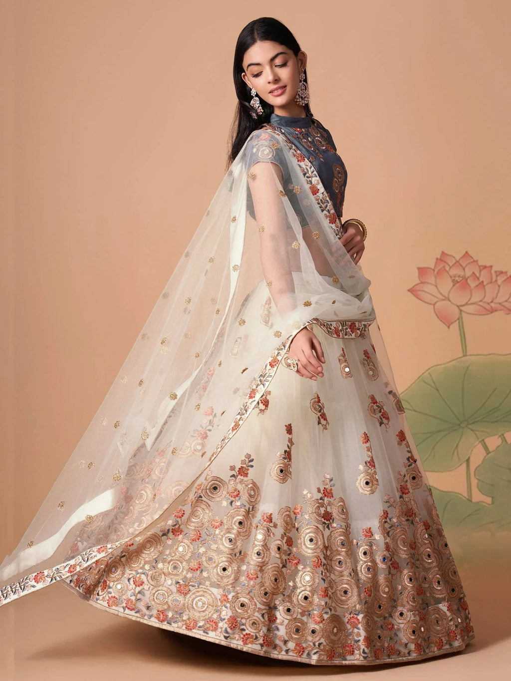 Tulsi Art Pretty Ivory Embroidered Net Party Wear Lehenga Choli | Grocsy