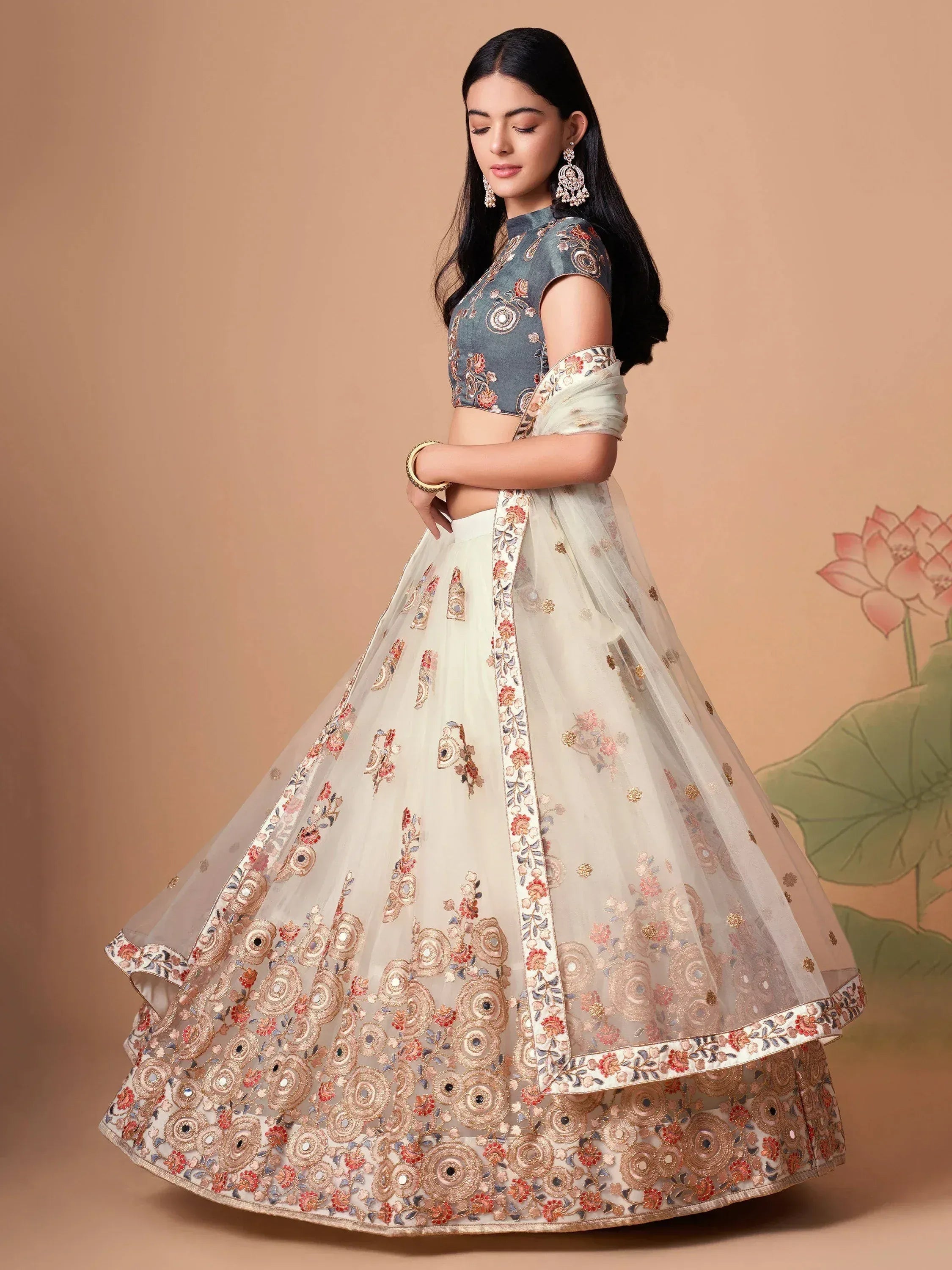 Tulsi Art Pretty Ivory Embroidered Net Party Wear Lehenga Choli | Grocsy