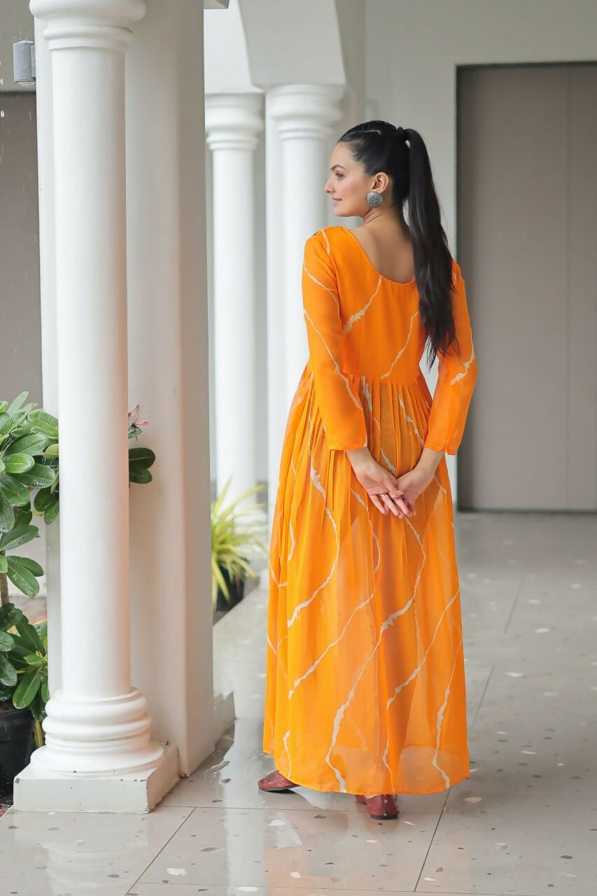 Vastranavya Orange Navratri Special Kutchi Patch Work with Leheriya Printed Kurti | Grocsy