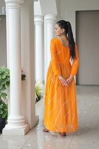 Vastranavya Orange Navratri Special Kutchi Patch Work with Leheriya Printed Kurti | Grocsy