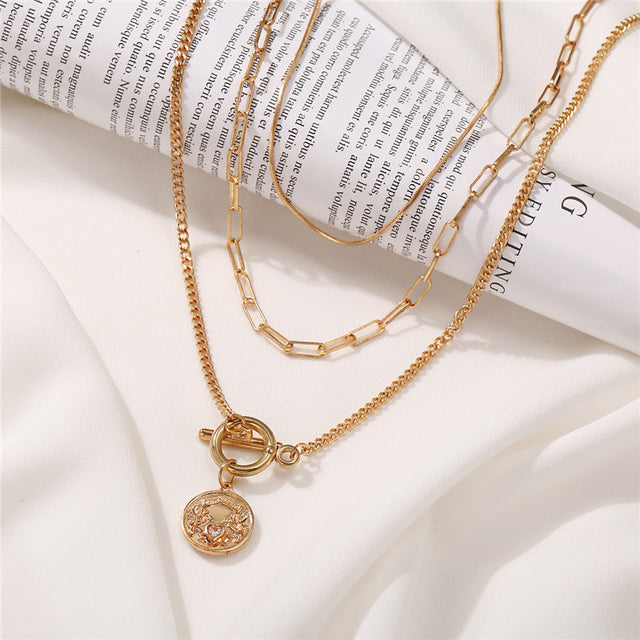 Gold-Polished Alloy Layered Designer Short Necklace - The Pari | Grocsy