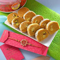 Auspicious Peach Om Rakhi & Batisha Slice Combo | Grocsy