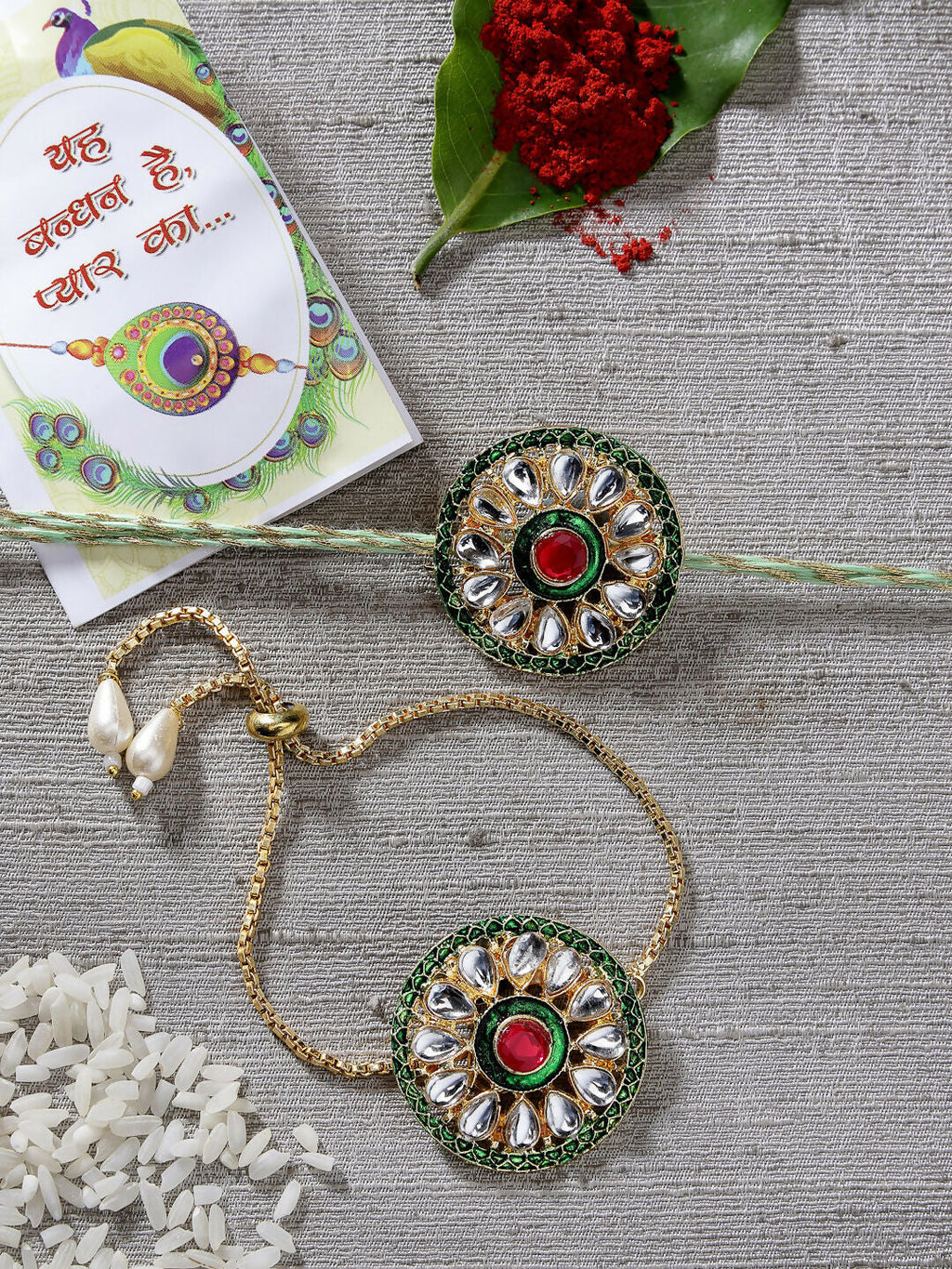 NVR Women & Men Set of 2 Gold Kundan-Studded Handcrafted Wraparound Rakhi Set With Roli Chawal & Chocolate | Grocsy